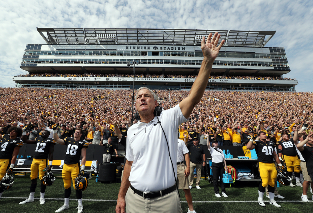 Iowa Hawkeyes head coach Kirk Ferentz waves to the Stead Family ChildrenÕs Hospital at the end of the first quarter of their game against the Rutgers Scarlet Knights Saturday, September 7, 2019 at Kinnick Stadium. (Brian Ray/hawkeyesports.com)