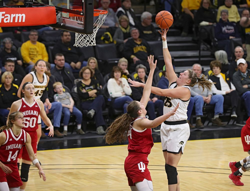 Iowa Hawkeyes forward Monika Czinano (25) makes a basket during the third quarter of their game at Carver-Hawkeye Arena in Iowa City on Sunday, January 12, 2020. (Stephen Mally/hawkeyesports.com)