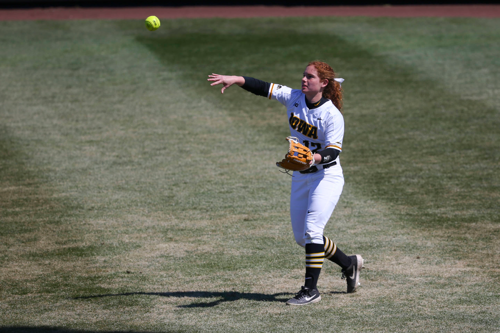 Iowa's Kate Claypool (12) at game 3 vs Northwestern on Sunday, March 31, 2019 at Bob Pearl Field. (Lily Smith/hawkeyesports.com)