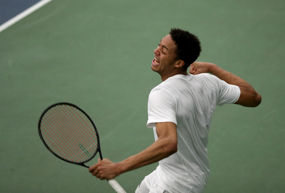 Iowa’s Oliver Okonkwo against Cornell Sunday, March 8, 2020 at the Hawkeye Tennis and Recreation Center. (Brian Ray/hawkeyesports.com)