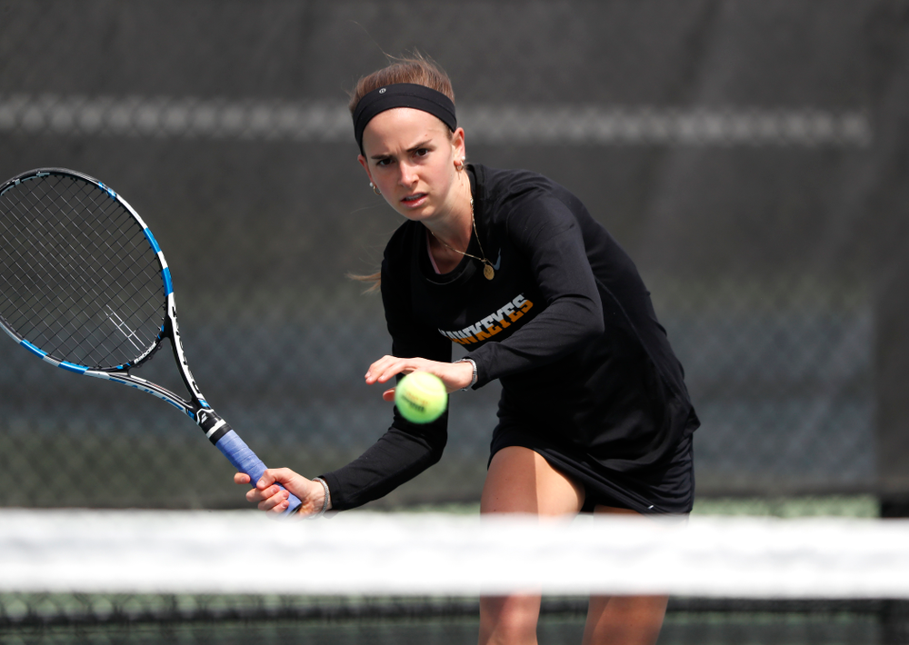Iowa's Adrienne Jensen against the Wisconsin Badgers Sunday, April 22, 2018 at the Hawkeye Tennis and Recreation Center. (Brian Ray/hawkeyesports.com)