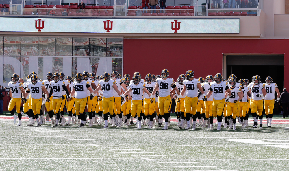 The Iowa Hawkeyes swarm out for their game against the Indiana Hoosiers Saturday, October 13, 2018 at Memorial Stadium, in Bloomington, Ind. (Max Allen/hawkeyesports.com)
