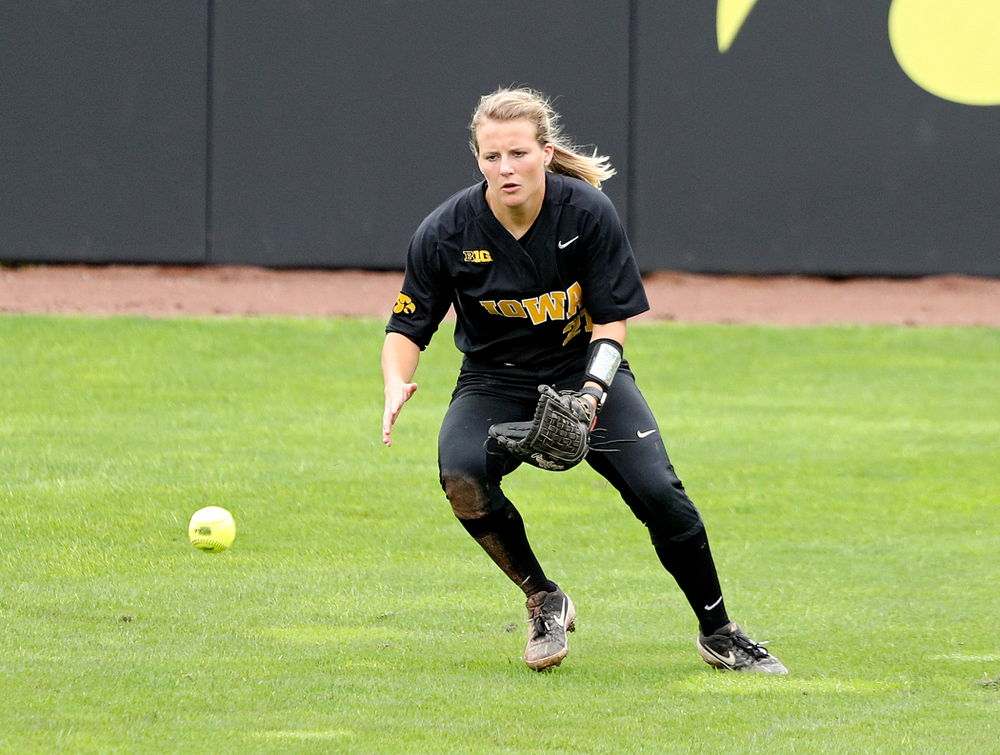 Iowa outfielder Havyn Monteer (21) fields a ball during the fifth inning of their game against Iowa Softball vs Indian Hills Community College at Pearl Field in Iowa City on Sunday, Oct 6, 2019. (Stephen Mally/hawkeyesports.com)