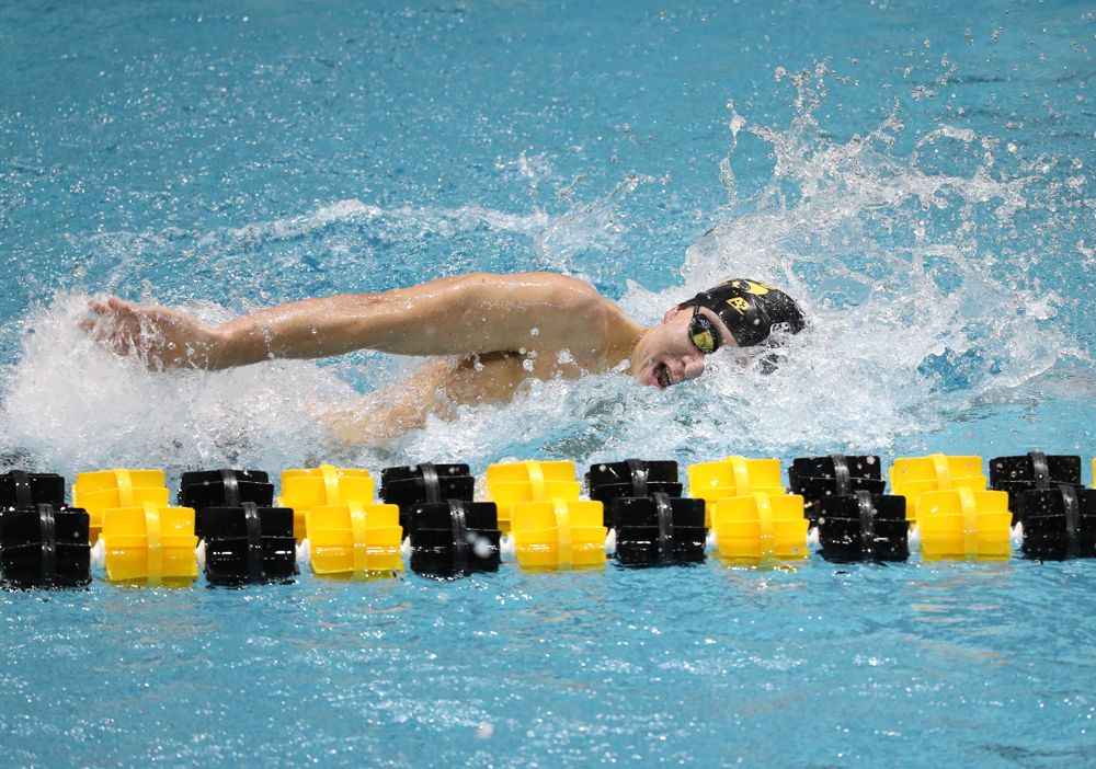 Iowa's Michael Tenney swims the third leg of the 800 freestyle relay at the 2019 Big Ten Swimming and Diving meet Wednesday, February 27, 2019 at the Campus Wellness and Recreation Center. (Brian Ray/hawkeyesports.com)