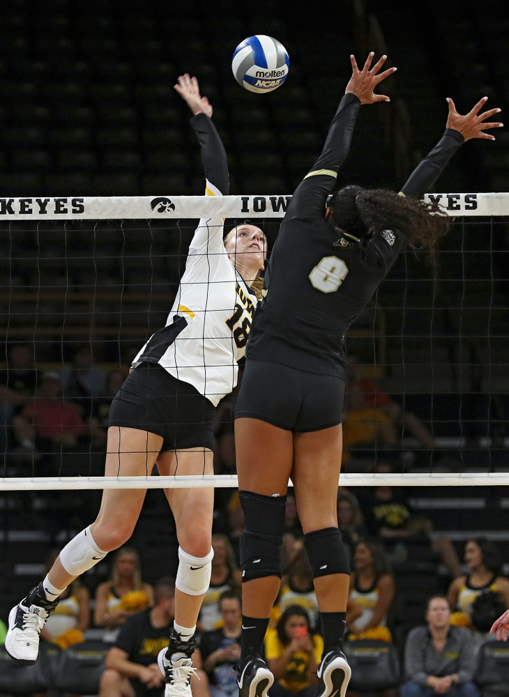 Iowa’s Hannah Clayton (18) lines up a shot during the second set of their Big Ten/Pac-12 Challenge match against Colorado at Carver-Hawkeye Arena in Iowa City on Friday, Sep 6, 2019. (Stephen Mally/hawkeyesports.com)