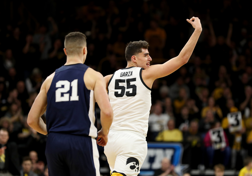 Iowa Hawkeyes forward Luka Garza (55) celebrates a three point basket against Penn State Saturday, February 29, 2020 at Carver-Hawkeye Arena. (Brian Ray/hawkeyesports.com)