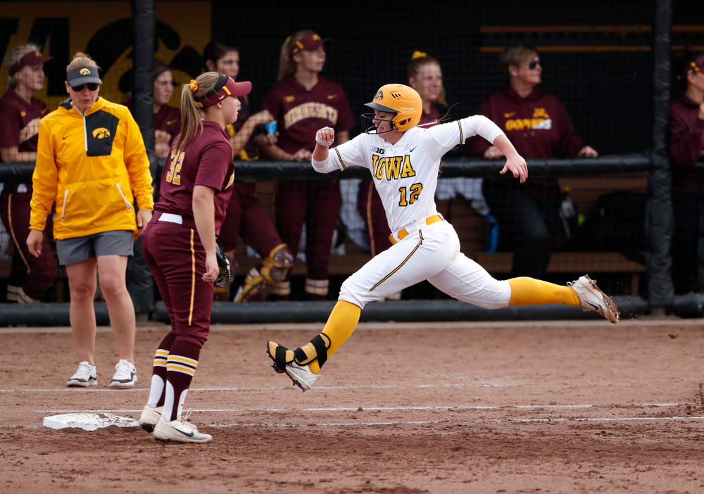 Iowa Hawkeyes catcher Angela Schmiederer (12) against the Minnesota Golden Gophers Thursday, April 12, 2018 at Bob Pearl Field. (Brian Ray/hawkeyesports.com)