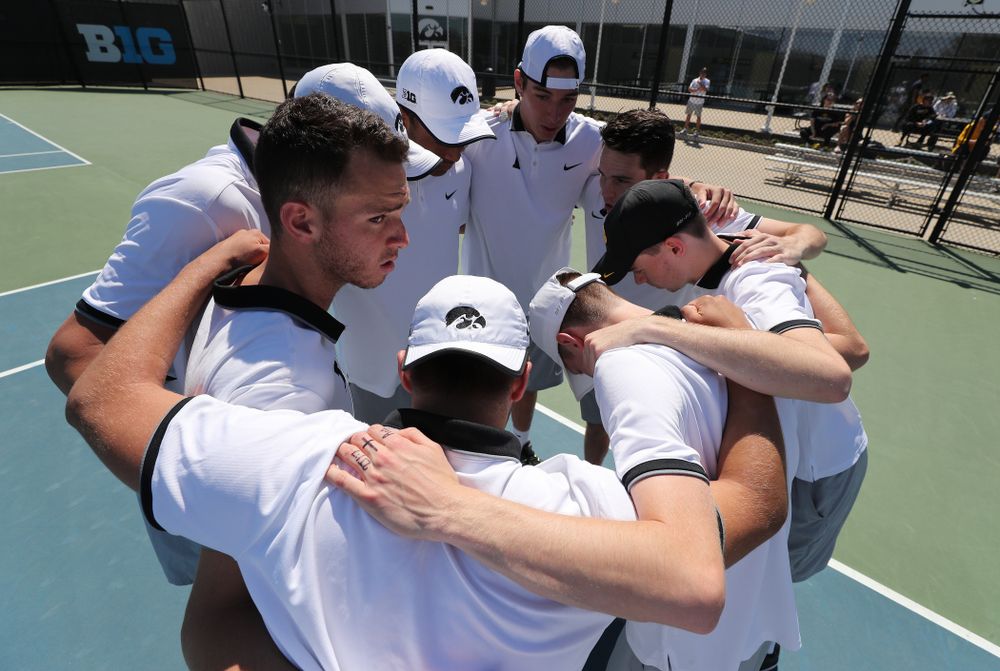 IowaÕs Jonas Larsen pumps up his teammates before their game against the Michigan Wolverines Sunday, April 21, 2019 at the Hawkeye Tennis and Recreation Complex. (Brian Ray/hawkeyesports.com)