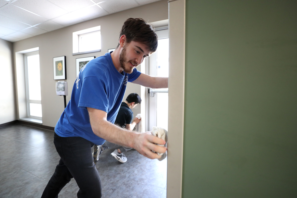 Members of the MenÕs Gymnastics team volunteer at CommUnity Crisis Services and Food Bank during the annual Iowa Athletics Day of Caring Sunday, April 28, 2019 in Iowa City. (Brian Ray/hawkeyesports.com)