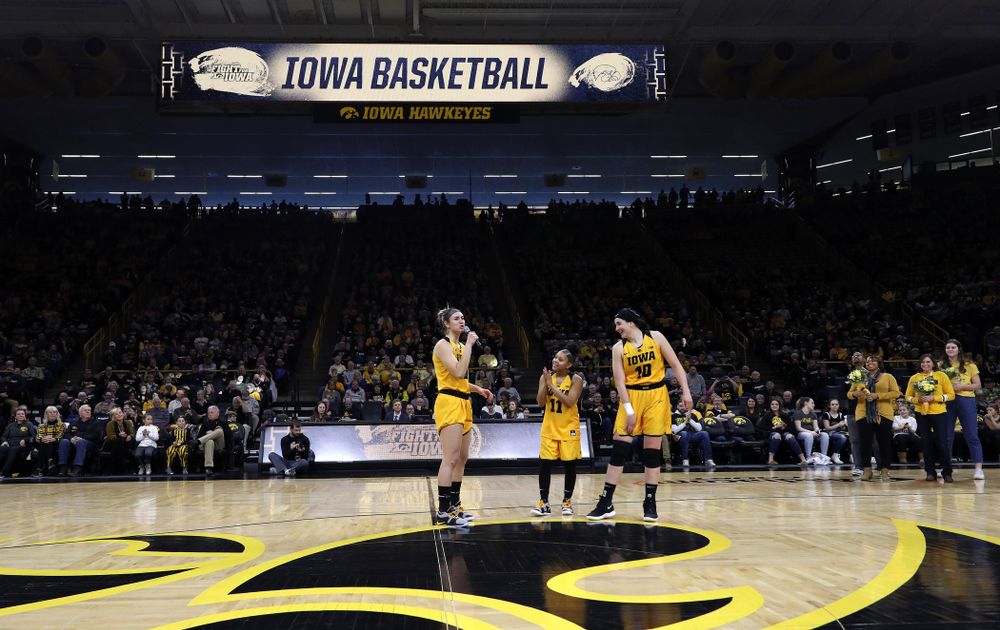 Iowa Hawkeyes forward Megan Gustafson (10), guard Tania Davis (11), and forward Hannah Stewart (21) during senior day ceremonies following their game against the Northwestern Wildcats Sunday, March 3, 2019 at Carver-Hawkeye Arena. (Brian Ray/hawkeyesports.com)