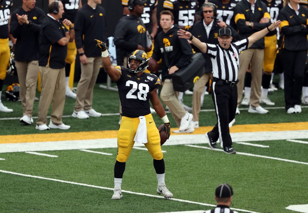 Iowa Hawkeyes running back Toren Young (28) signals for a first down against Middle Tennessee State Saturday, September 28, 2019 at Kinnick Stadium. (Brian Ray/hawkeyesports.com)