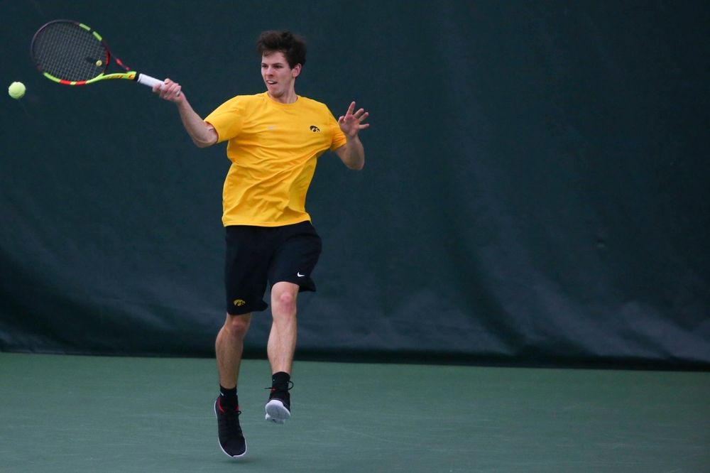Iowa's Joe Tyler at a tennis match vs Drake Friday, March 8, 2019 at the Hawkeye Tennis and Recreation Complex. (Lily Smith/hawkeyesports.com)