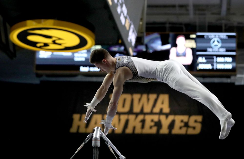 Iowa’s Mitch Mandozzi competes on the high bar against Illinois Sunday, March 1, 2020 at Carver-Hawkeye Arena. (Brian Ray/hawkeyesports.com)