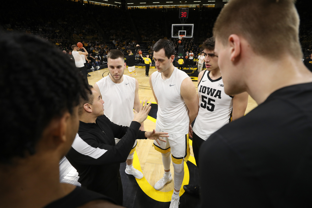 Iowa Hawkeyes guard Connor McCaffery (30), forward Ryan Kriener (15), and forward Luka Garza (55) against the Purdue Boilermakers Tuesday, March 3, 2020 at Carver-Hawkeye Arena. (Brian Ray/hawkeyesports.com)