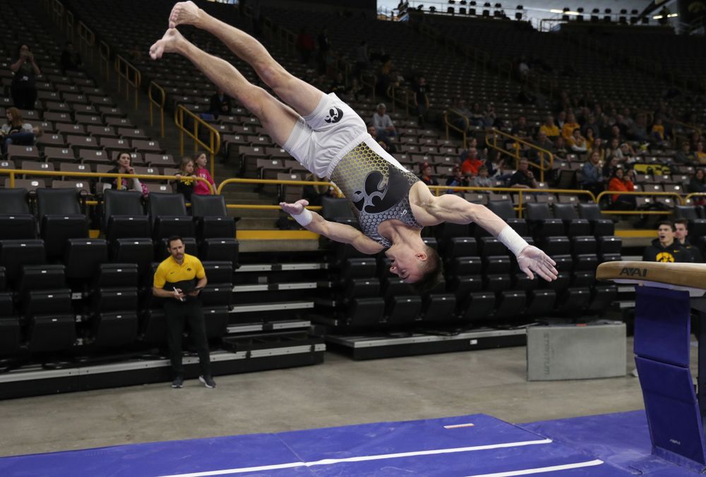 Iowa’s Mitch Mandozzi competes on the vault against Illinois Sunday, March 1, 2020 at Carver-Hawkeye Arena. (Brian Ray/hawkeyesports.com)