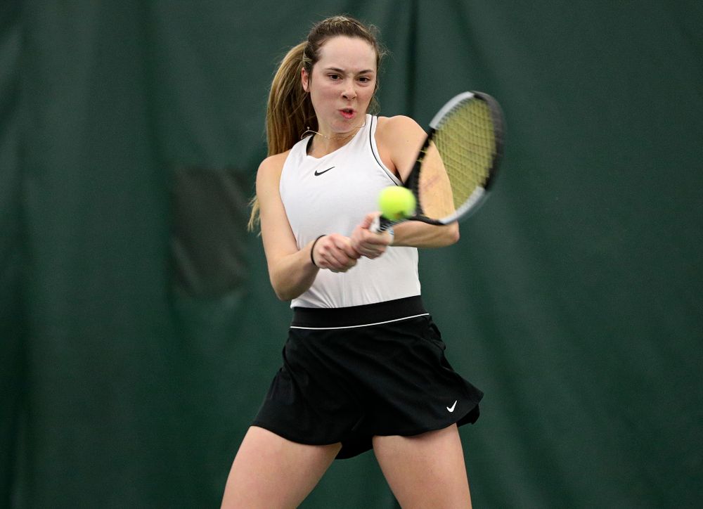 Iowa’s Samantha Mannix returns a shot during her doubles match at the Hawkeye Tennis and Recreation Complex in Iowa City on Sunday, February 16, 2020. (Stephen Mally/hawkeyesports.com)