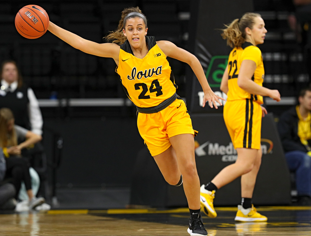 Iowa guard Gabbie Marshall (24) grabs a turnover during the second quarter of their game against Winona State at Carver-Hawkeye Arena in Iowa City on Sunday, Nov 3, 2019. (Stephen Mally/hawkeyesports.com)
