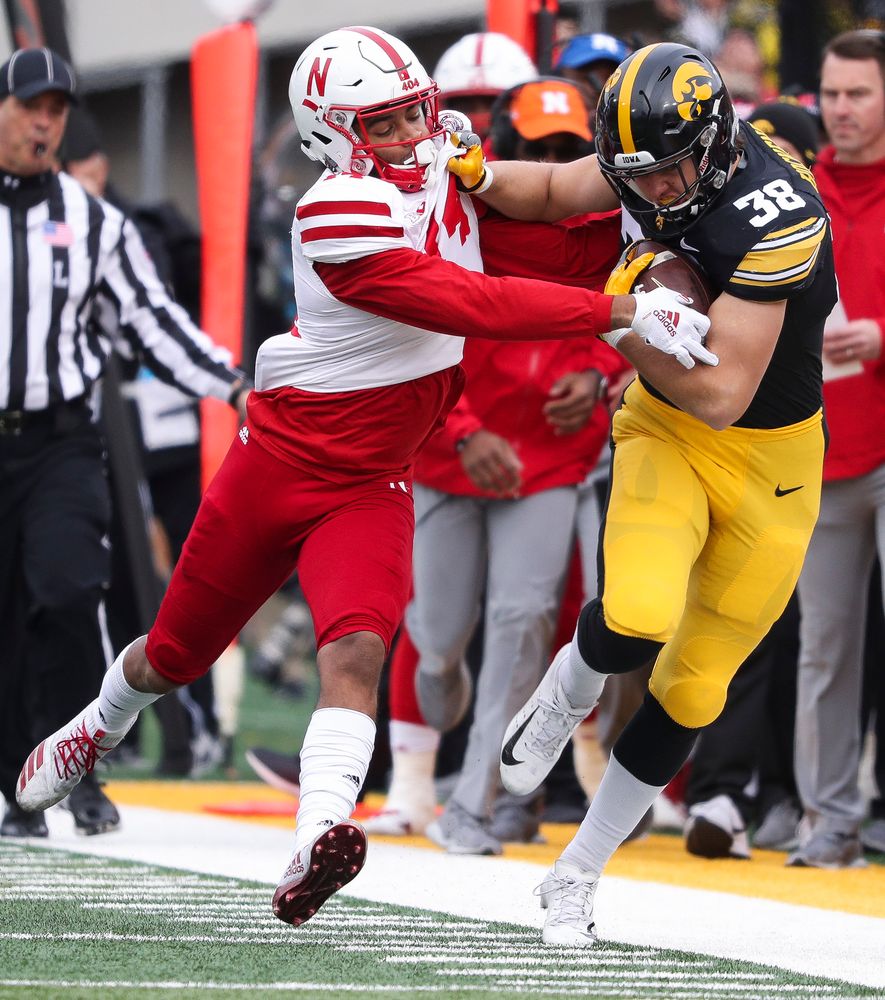 Iowa Hawkeyes tight end T.J. Hockenson (38) runs the ball during a game against Nebraska at Kinnick Stadium on November 23, 2018. (Tork Mason/hawkeyesports.com)