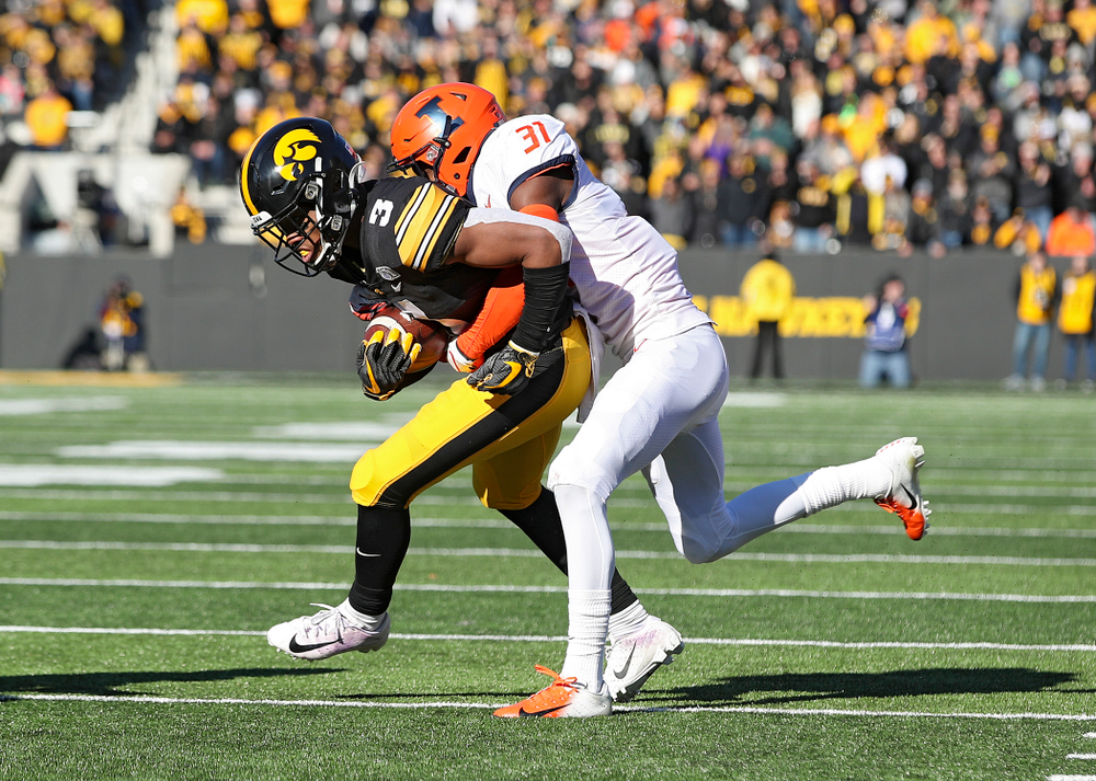 Iowa Hawkeyes wide receiver Tyrone Tracy Jr. (3) runs after pulling in a pass during the third quarter of their game at Kinnick Stadium in Iowa City on Saturday, Nov 23, 2019. (Stephen Mally/hawkeyesports.com)