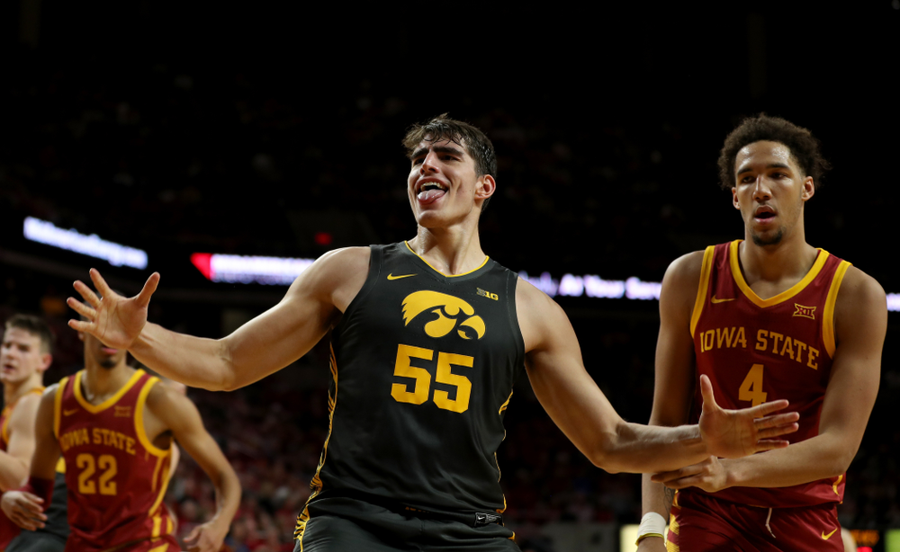 Iowa Hawkeyes forward Luka Garza (55) celebrates after dunking the ball against the Iowa State Cyclones Thursday, December 12, 2019 at Hilton Coliseum in Ames, Iowa(Brian Ray/hawkeyesports.com)