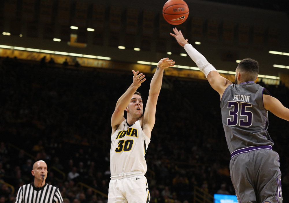 Iowa Hawkeyes guard Connor McCaffery (30) knocks down a three point basket against the Northwestern Wildcats Sunday, February 10, 2019 at Carver-Hawkeye Arena. (Brian Ray/hawkeyesports.com)