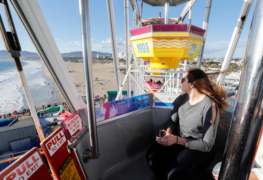 Iowa Hawkeyes forward Megan Gustafson (10) rides the ferris wheel in Pacific Park on the Santa Monica Pier Thursday, March 15, 2018 in Santa Monica. (Brian Ray/hawkeyesports.com)