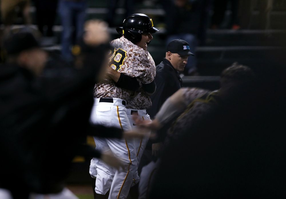 Iowa Hawkeyes Chris Whelan (28) celebrates their walk off win against the Nebraska Cornhuskers on Military Appreciation Night Friday, April 19, 2019 at Duane Banks Field. (Brian Ray/hawkeyesports.com)