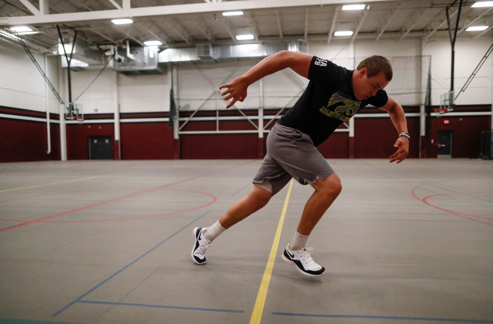 Iowa Hawkeyes quarterback Nathan Stanley (4) works out at his high school Wednesday, May 30, 2018 in Menomonie, Wisc. (Brian Ray/hawkeyesports.com)