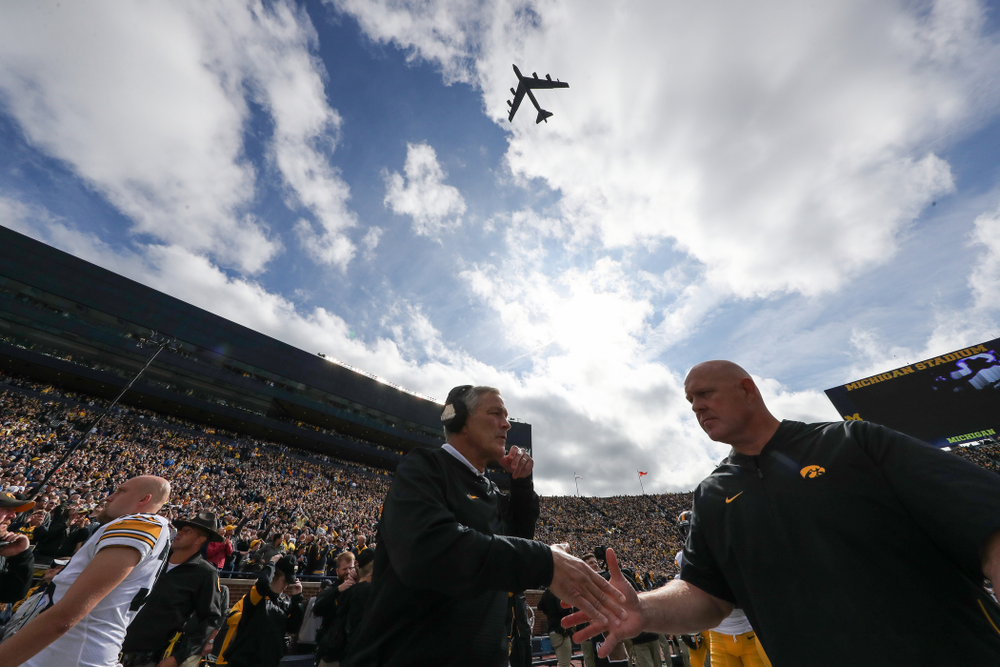 Iowa Hawkeyes head coach Kirk Ferentz and strength and conditioning coordinator Chris Doyle against the Michigan Wolverines Saturday, October 5, 2019 at Michigan Stadium in Ann Arbor, MI. (Brian Ray/hawkeyesports.com)