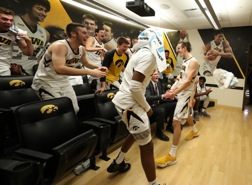 Iowa Hawkeyes forward Nicholas Baer (51) celebrates their victory against the Pitt Panthers Tuesday, November 27, 2018 at Carver-Hawkeye Arena. (Brian Ray/hawkeyesports.com)