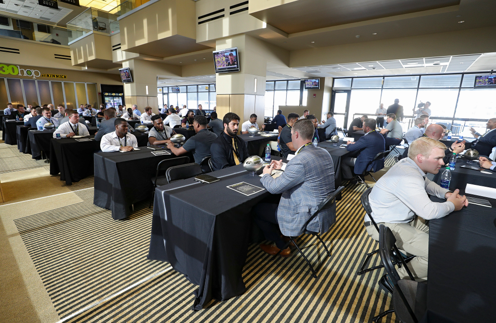 Former players meet with members of the current Hawkeye Football team during a networking event at Kinnick Stadium in Iowa City on Thursday, Jun 6, 2019. (Stephen Mally/hawkeyesports.com)