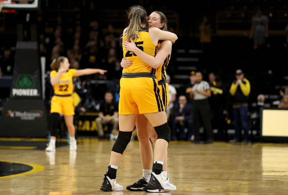 Iowa Hawkeyes forward Amanda Ollinger (43) and forward/center Monika Czinano against the Minnesota Golden Gophers Thursday, February 27, 2020 at Carver-Hawkeye Arena. (Brian Ray/hawkeyesports.com)