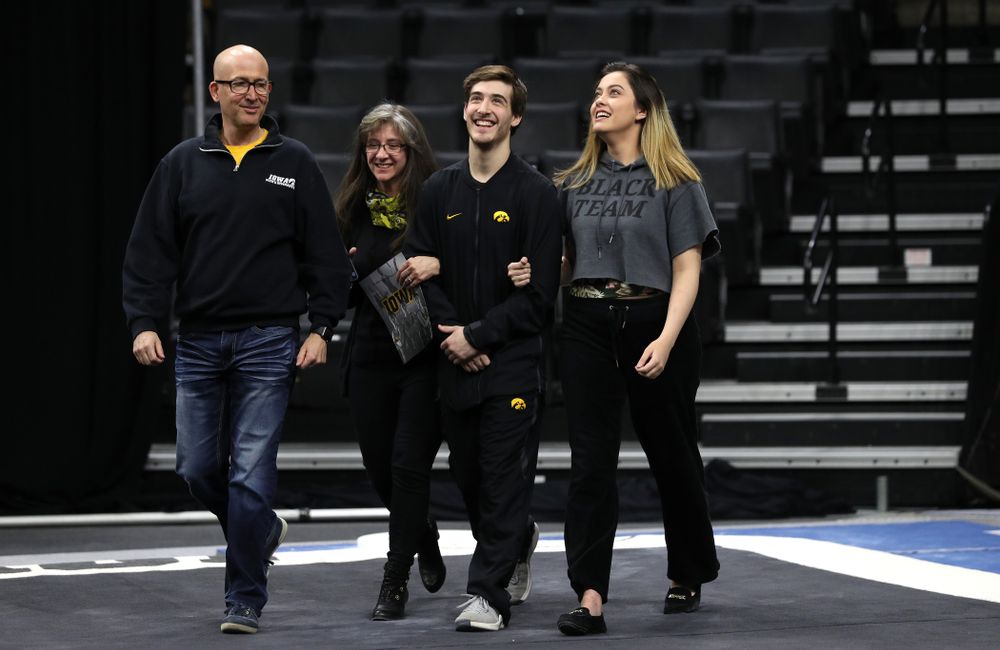 Iowa Men's Gymnast Kevin Johnson and his family during senior day ceremonies following their meet against the Ohio State Buckeyes Saturday, March 16, 2019 at Carver-Hawkeye Arena. (Brian Ray/hawkeyesports.com)
