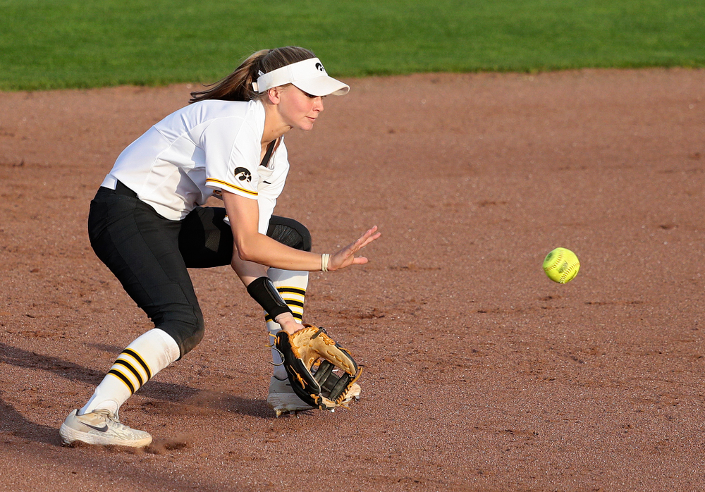 Iowa second baseman Aralee Bogar (2) fields a ground ball before turning an inning ending double play during the sixth inning of their game against Ohio State at Pearl Field in Iowa City on Friday, May. 3, 2019. (Stephen Mally/hawkeyesports.com)