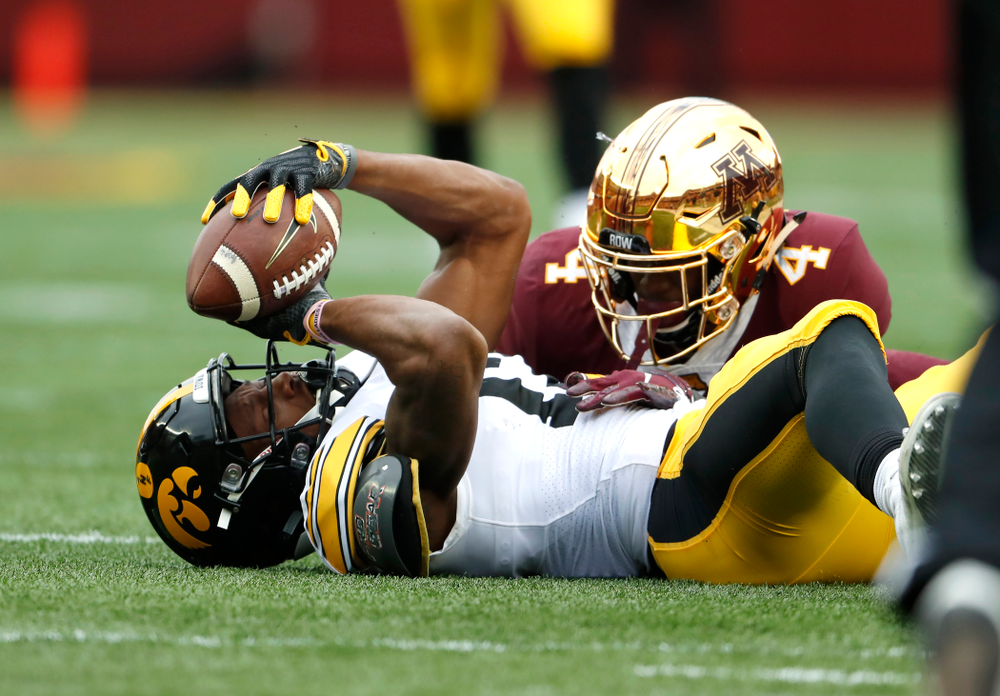 Iowa Hawkeyes wide receiver Brandon Smith (12) makes a catch against the Minnesota Golden Gophers Saturday, October 6, 2018 at TCF Bank Stadium. (Brian Ray/hawkeyesports.com)