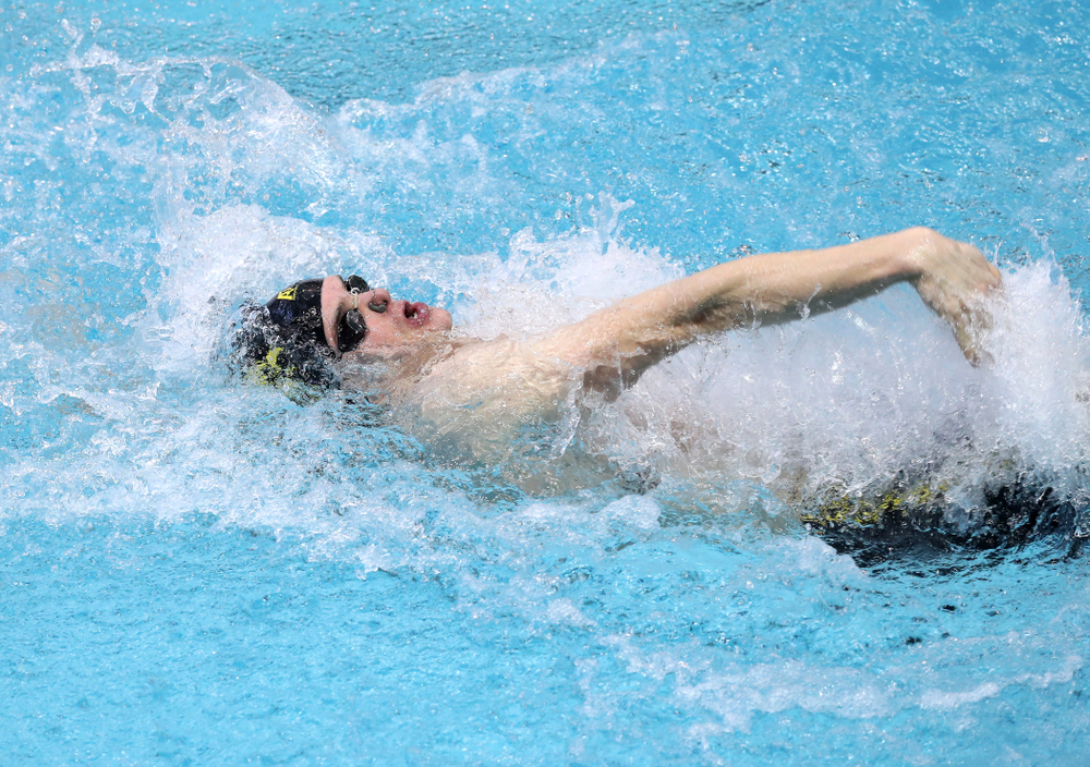 Iowa's Kenneth Mende competes in the 100-yard backstroke on the third day at the 2019 Big Ten Swimming and Diving Championships Thursday, February 28, 2019 at the Campus Wellness and Recreation Center. (Brian Ray/hawkeyesports.com)