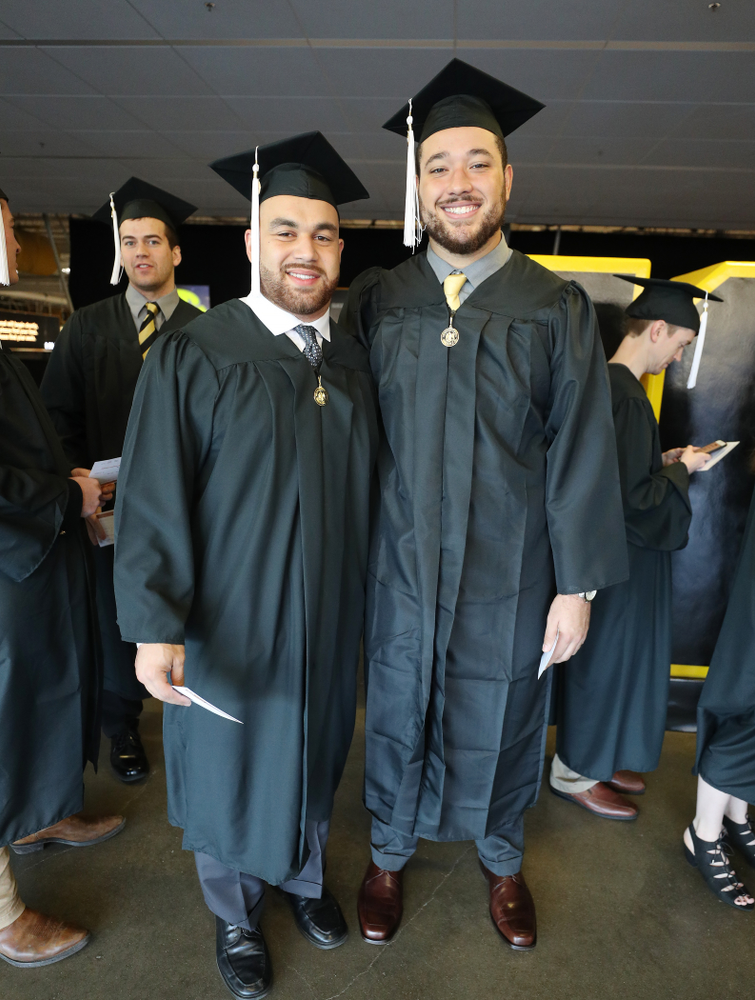 Iowa Football's Austin Kelly and Dalton Ferguson during the Fall Commencement Ceremony Saturday, December 15, 2018 at Carver-Hawkeye Arena. (Brian Ray/hawkeyesports.com)