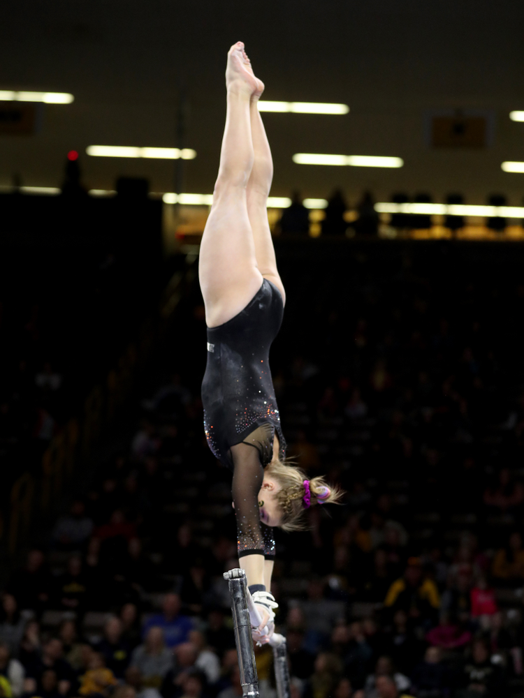 Iowa’s Allyson Steffensmeier competes on the bars against Michigan Friday, February 14, 2020 at Carver-Hawkeye Arena. (Brian Ray/hawkeyesports.com)