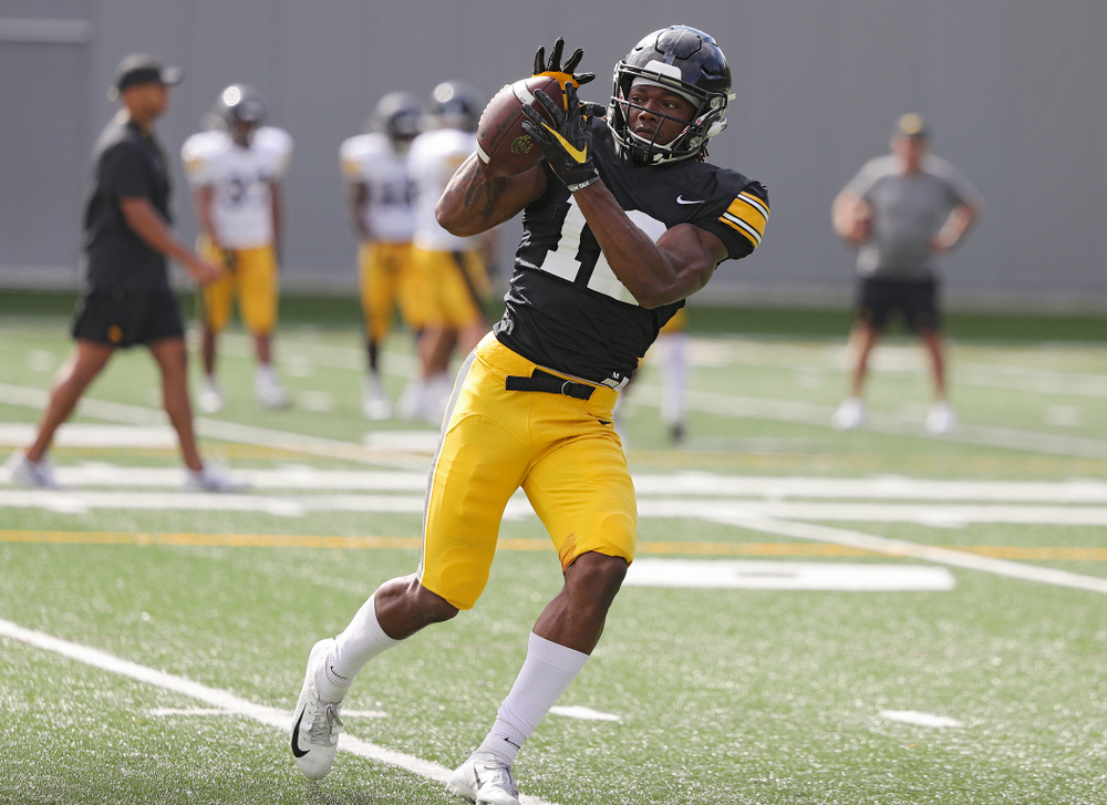 Iowa Hawkeyes wide receiver Brandon Smith (12) pulls in a pass during Fall Camp Practice No. 11 at the Hansen Football Performance Center in Iowa City on Wednesday, Aug 14, 2019. (Stephen Mally/hawkeyesports.com)