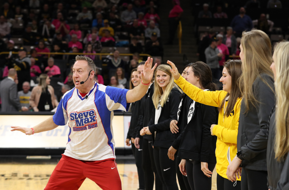 The Iowa Field Hockey Team, Soccer Team, Tennis Team, and Volleyball team play Simon Sez as they celebrate National Girls and Women in Sports day during halftime of the Iowa Hawkeyes game against the seventh ranked Maryland Terrapins Sunday, February 17, 2019 at Carver-Hawkeye Arena. (Brian Ray/hawkeyesports.com)
