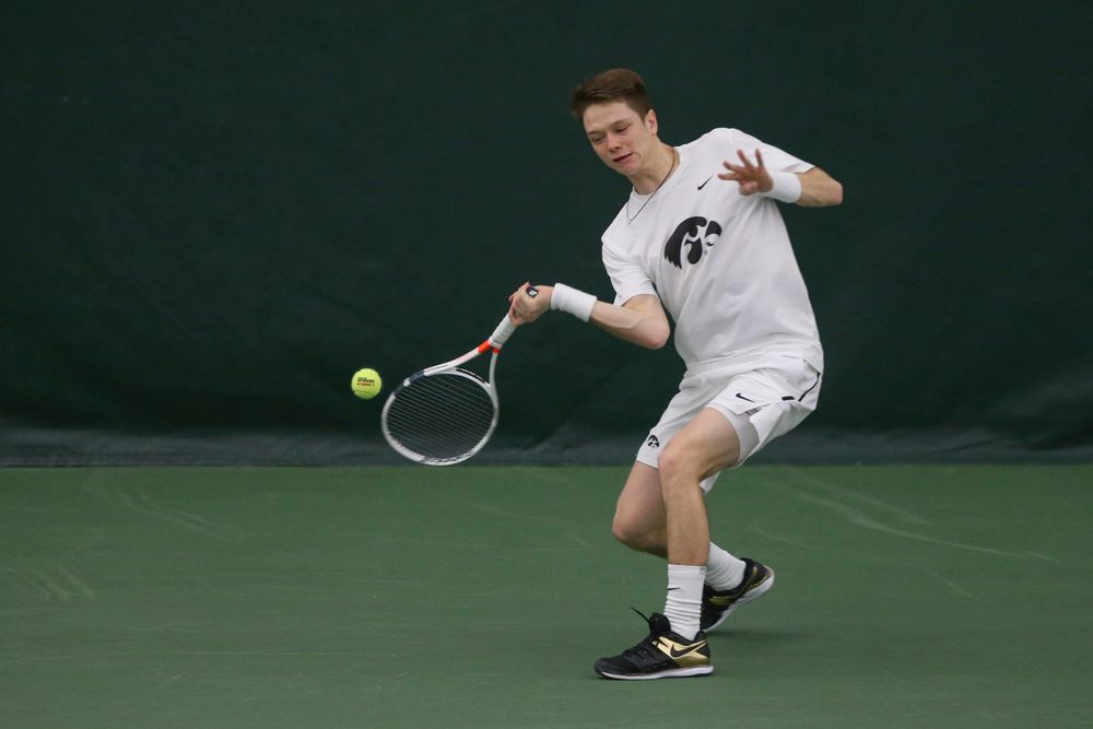 Iowa’s Jason Kerst returns a hit during the Iowa men’s tennis meet vs Nebraska on Sunday, March 1, 2020 at the Hawkeye Tennis and Recreation Complex. (Lily Smith/hawkeyesports.com)
