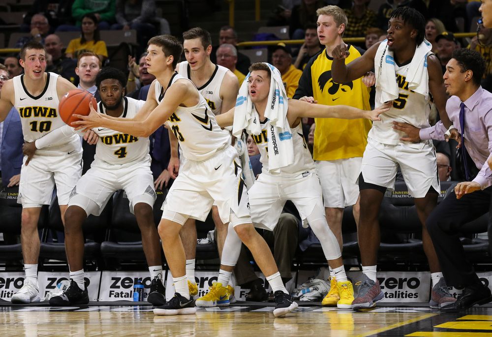 The Iowa Hawkeyes bench anticipates a 3-point shot attempt by Iowa Hawkeyes guard Austin Ash (13) during a game against Alabama State at Carver-Hawkeye Arena on November 21, 2018. (Tork Mason/hawkeyesports.com)
