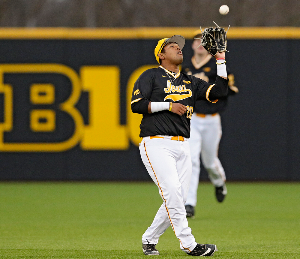 Iowa Hawkeyes second baseman Izaya Fullard (20) pulls in a pop up for an out during the seventh inning of their game against Illinois State at Duane Banks Field in Iowa City on Wednesday, Apr. 3, 2019. (Stephen Mally/hawkeyesports.com)