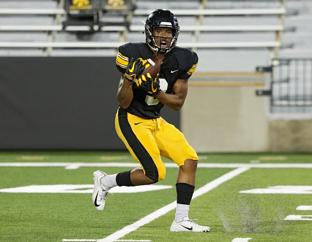 Iowa Hawkeyes wide receiver Tyrone Tracy Jr. (3) pulls in a touchdown pass during Fall Camp Practice No. 12 at Kinnick Stadium in Iowa City on Thursday, Aug 15, 2019. (Stephen Mally/hawkeyesports.com)