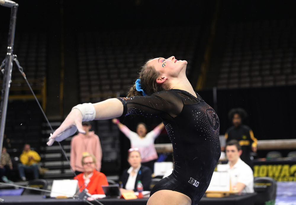 Iowa’s Mackenzie Vance competes on the bars against Michigan Friday, February 14, 2020 at Carver-Hawkeye Arena. (Brian Ray/hawkeyesports.com)