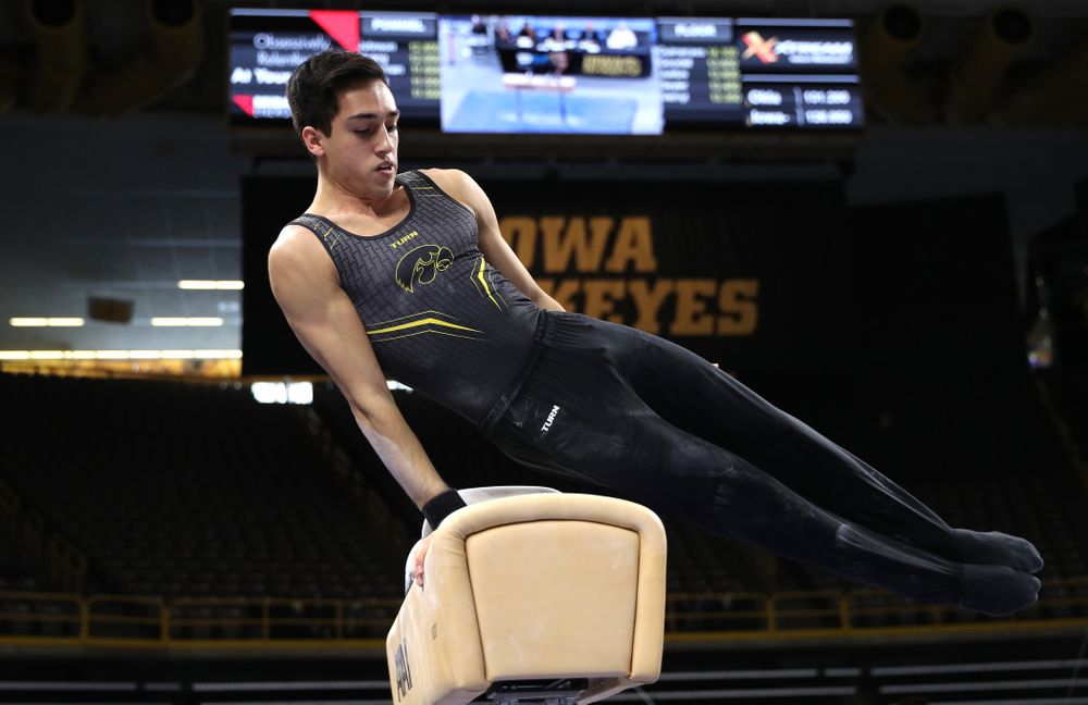 Iowa's Andrew Herrador competes on the Pommel Horse against Oklahoma Saturday, February 9, 2019 at Carver-Hawkeye Arena. (Brian Ray/hawkeyesports.com)