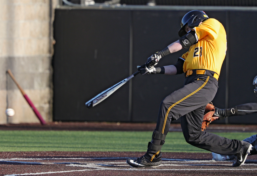Iowa Hawkeyes left fielder Chris Whelan (28) drives a pitch for a hit during the sixth inning of their game at Duane Banks Field in Iowa City on Tuesday, Apr. 2, 2019. (Stephen Mally/hawkeyesports.com)