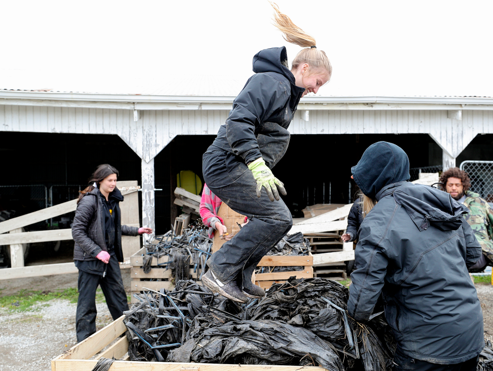 Iowa soccer players work at Grow: Johnson County at the Johnson County Historic Poor Farm during the 21st annual ISAAC Hawkeye Day of Caring in Iowa City on Sunday, Apr. 28, 2019. (Stephen Mally/hawkeyesports.com)