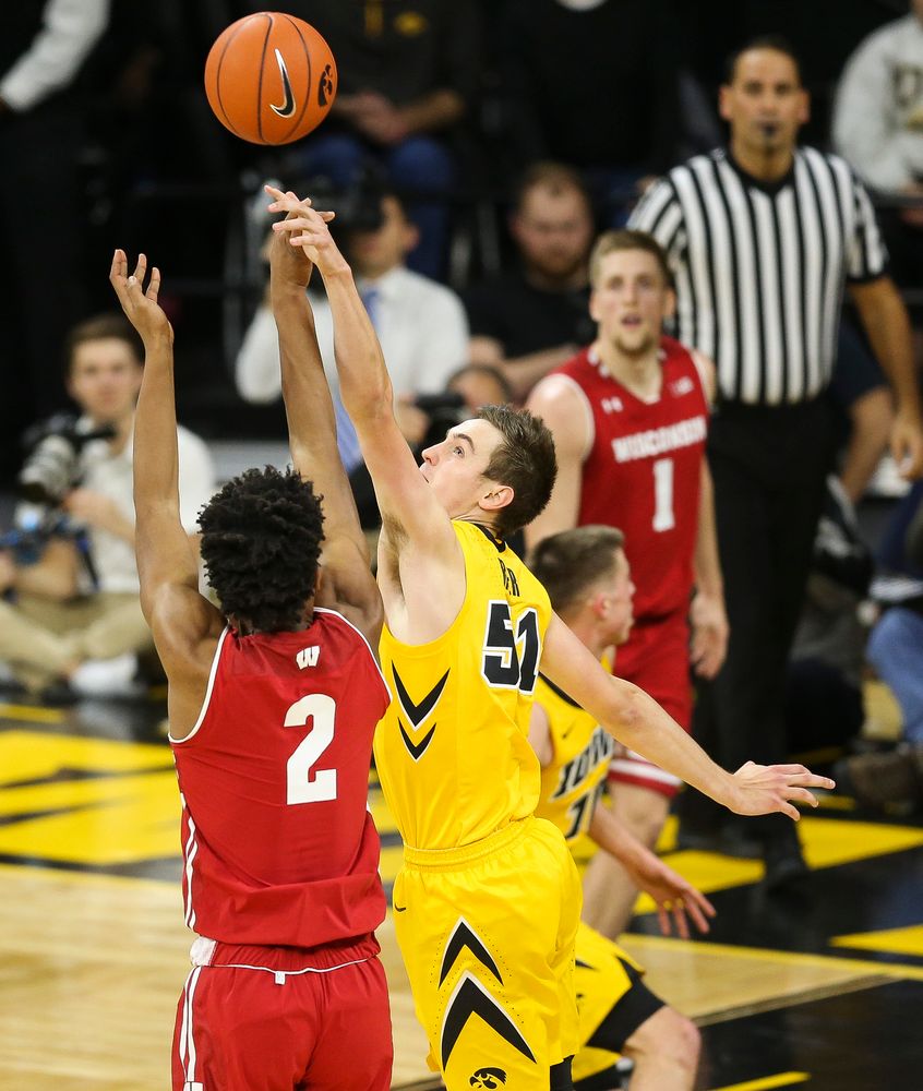 Iowa Hawkeyes forward Nicholas Baer (51) blocks a shot against Wisconsin on November 30, 2018 at Carver-Hawkeye Arena. (Tork Mason/hawkeyesports.com)