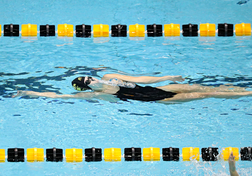 Iowa’s Zoe Pawloski swims the women’s 100-yard backstroke event during their meet against Michigan State and Northern Iowa at the Campus Recreation and Wellness Center in Iowa City on Friday, Oct 4, 2019. (Stephen Mally/hawkeyesports.com)